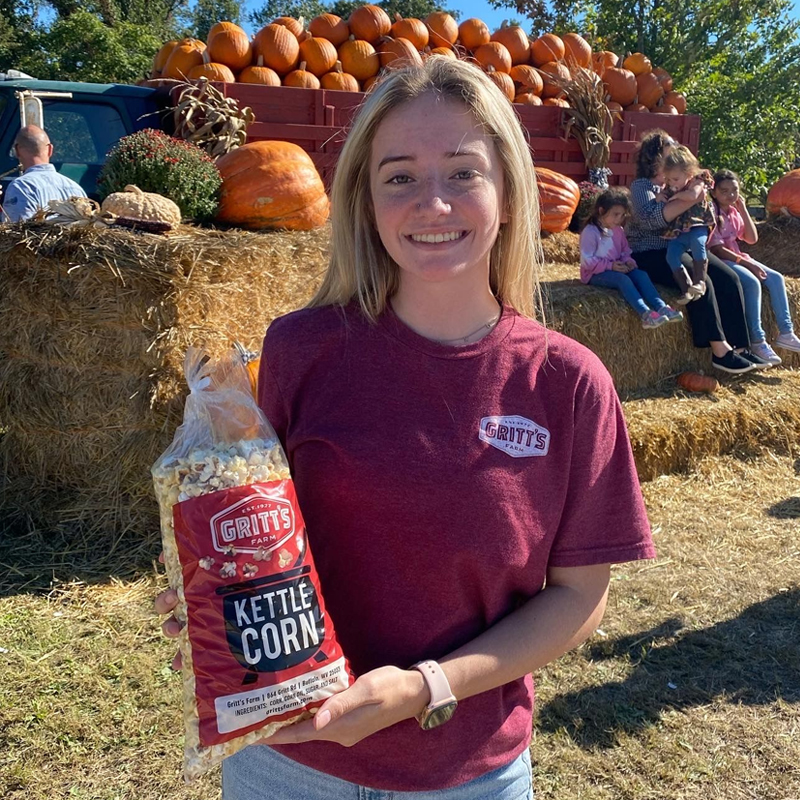 Smiling Employee With Kettle Corn Smiling Employee With Kettle Corn